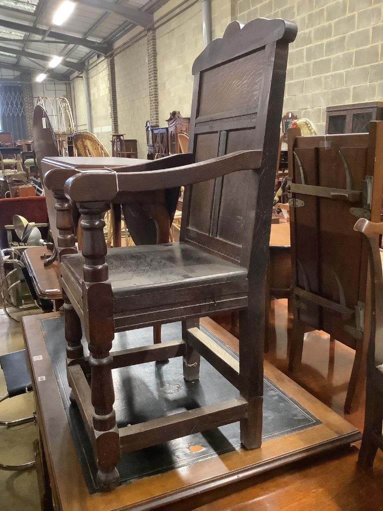 A 17th century style oak wainscot chair, width 48cm, depth 50cm, height 110cm